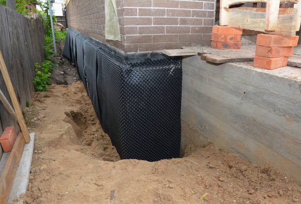 Happy homeowners after waterproofing job in Wanaque
